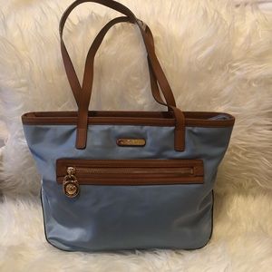 Gently used blue Michael Kors nylon tote purse.